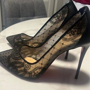 Lace Christian Louboutin pumps.